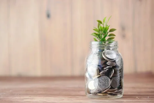 Stack of coins growing progressively taller representing compound interest growth