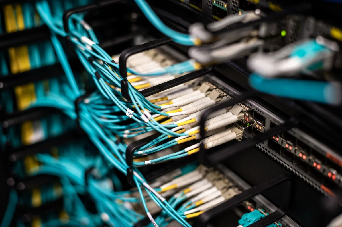 Rows of organized server room network cabling representing structured IP address allocation