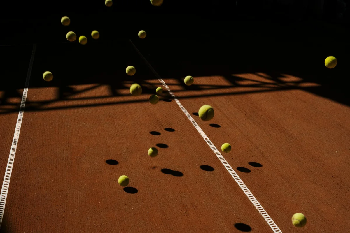 Ball flying through the air in a curved arc showing projectile trajectory