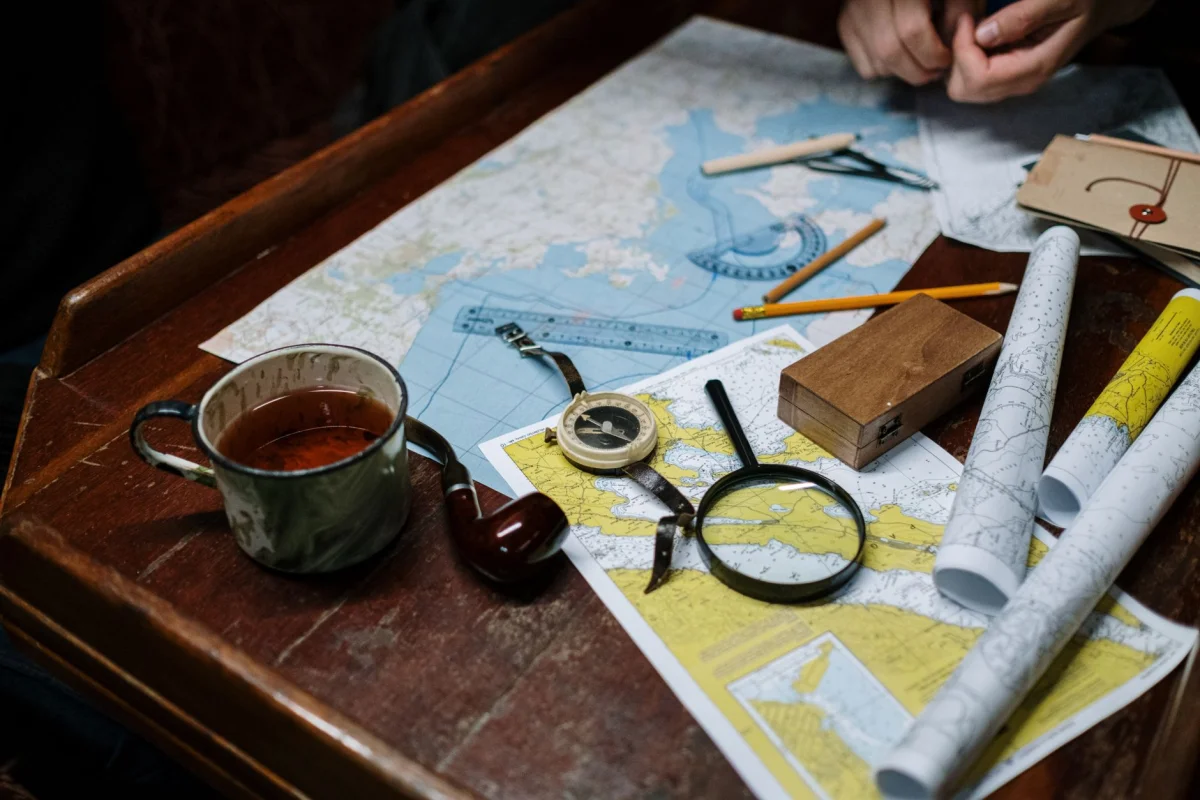 a compass resting on an open map, representing finding your way through what search engines and social platforms actually read