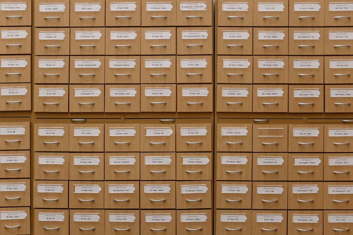 Wooden library card catalog drawers representing an indexed reference system