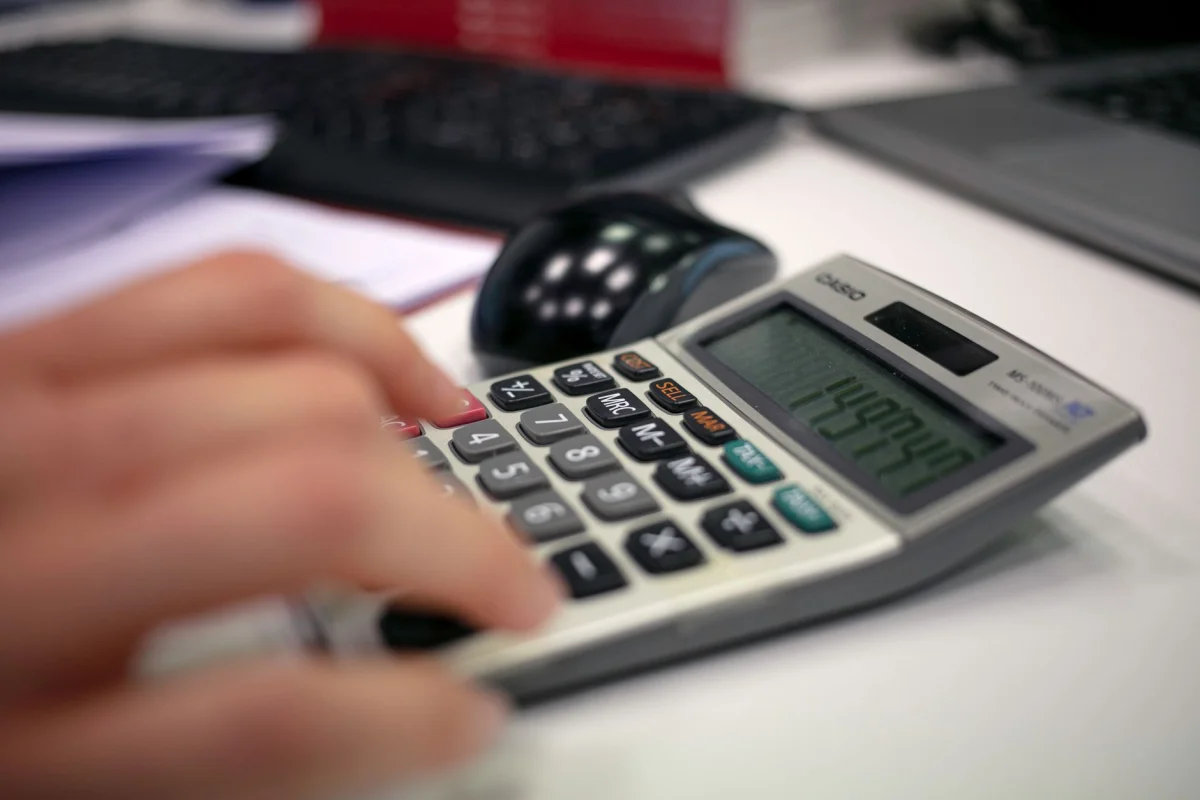 A digital calculator display representing estimating the cost of an AI API call before running it