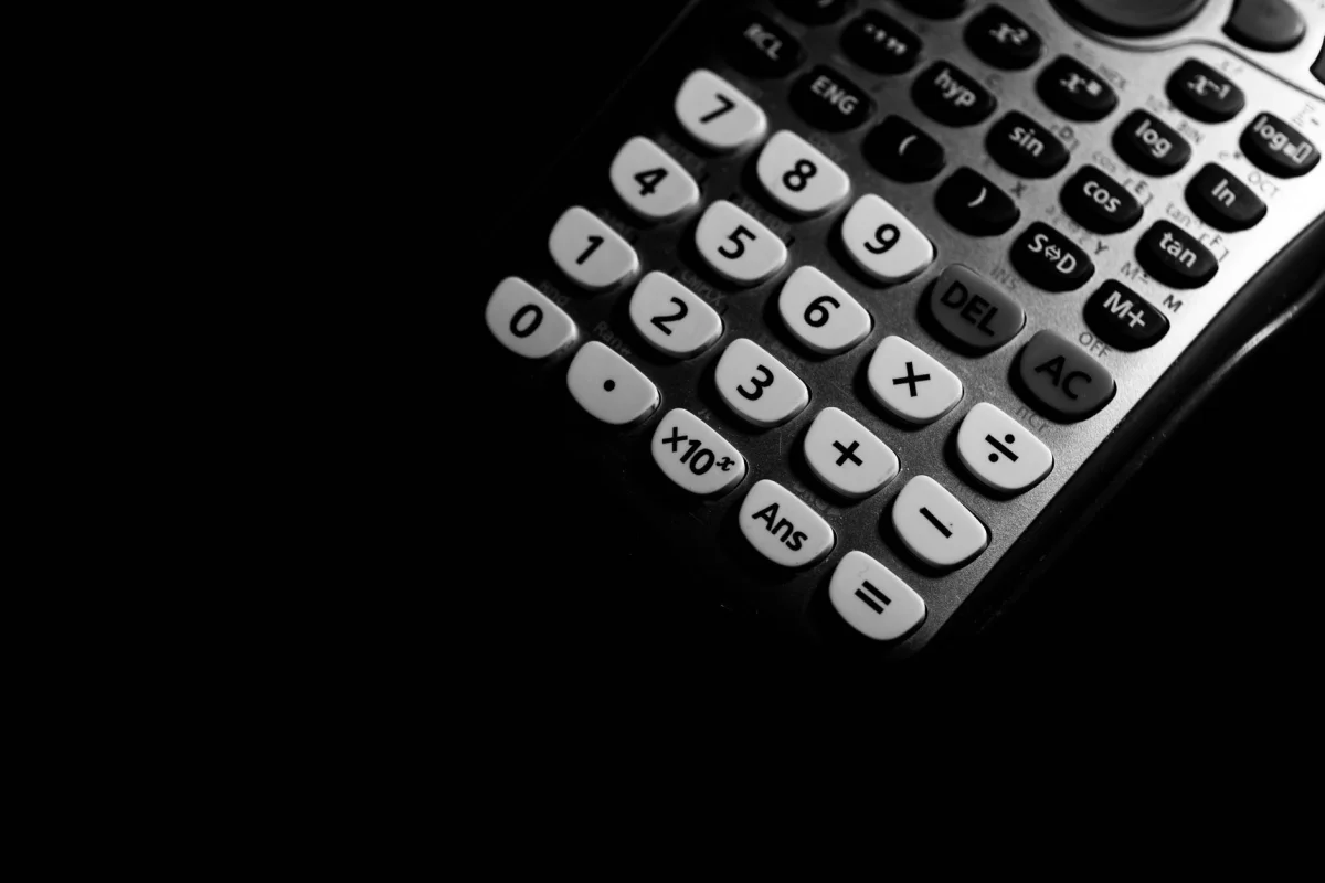 Close-up of scientific calculator buttons showing trig and log functions